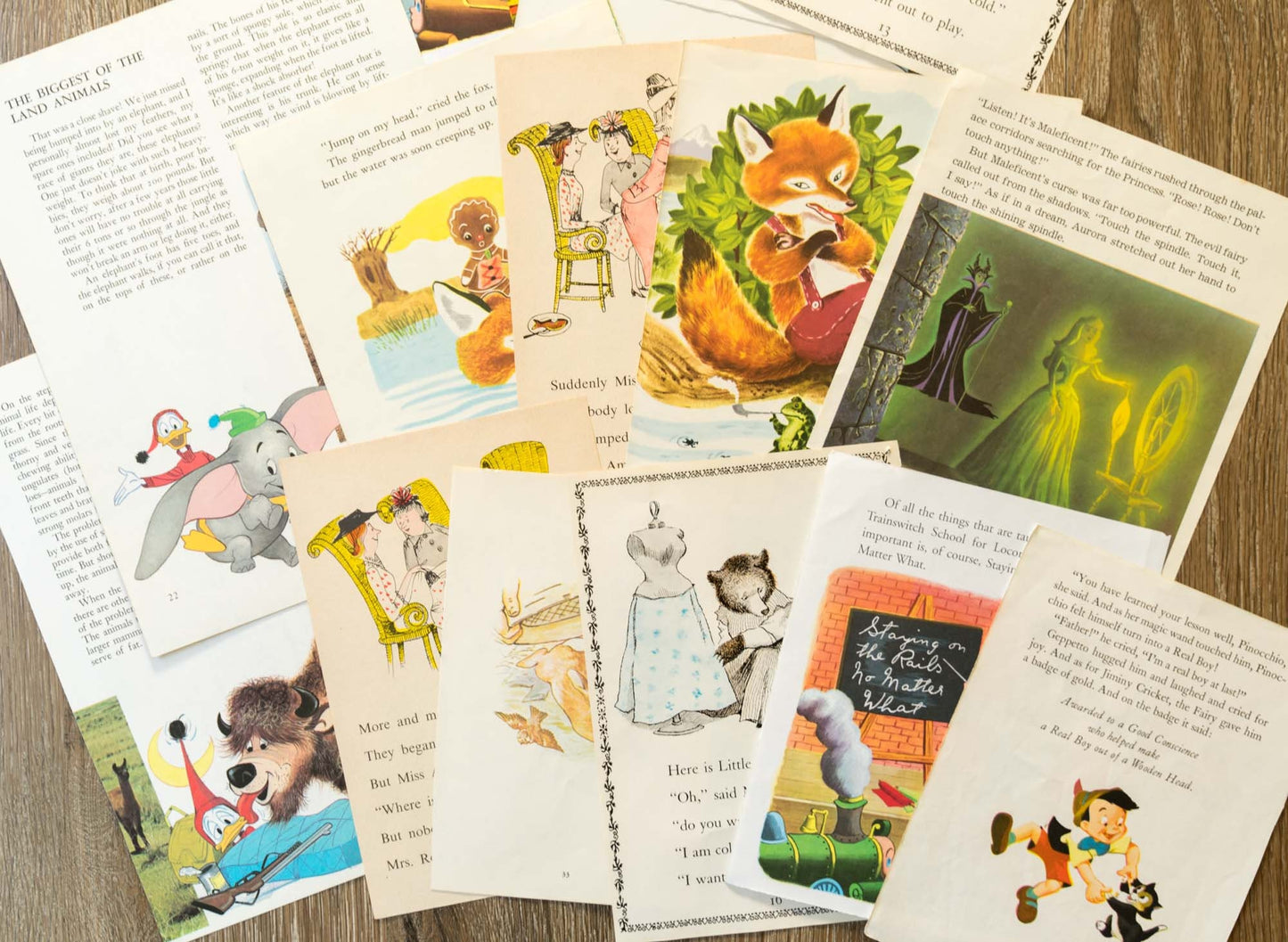 Top-down image of assorted vintage children’s storybook pages with aged edges and illustrations, styled with hardcover books on a wood surface.
