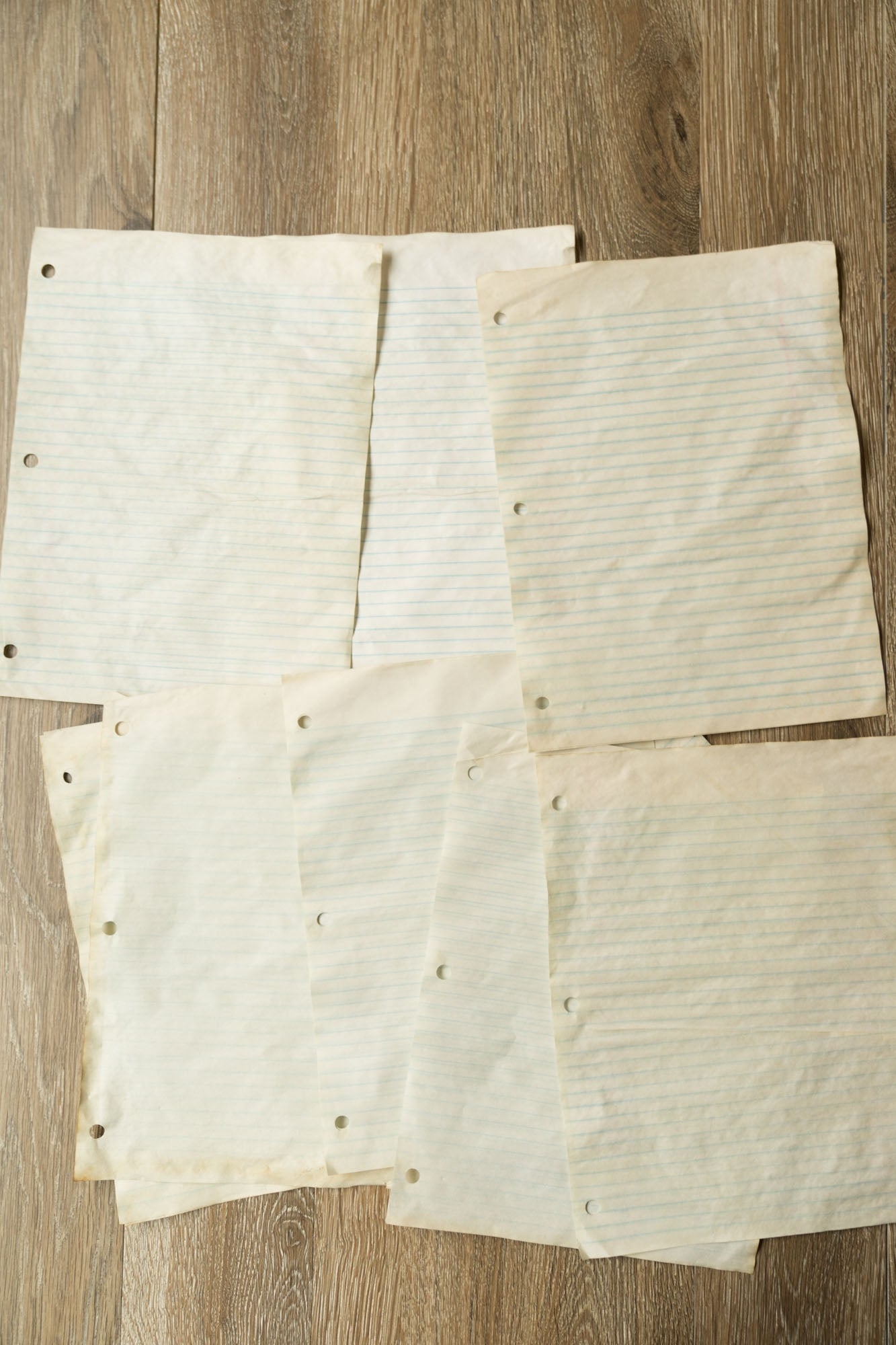 Detailed photo of Lined Coffee Dyed Lined paper Flat Lay on a wooden table